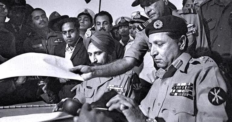 Fall of East Pakistan, Pakistani commander Lt Gen A K Niazi signing the surrender document in Dhaka